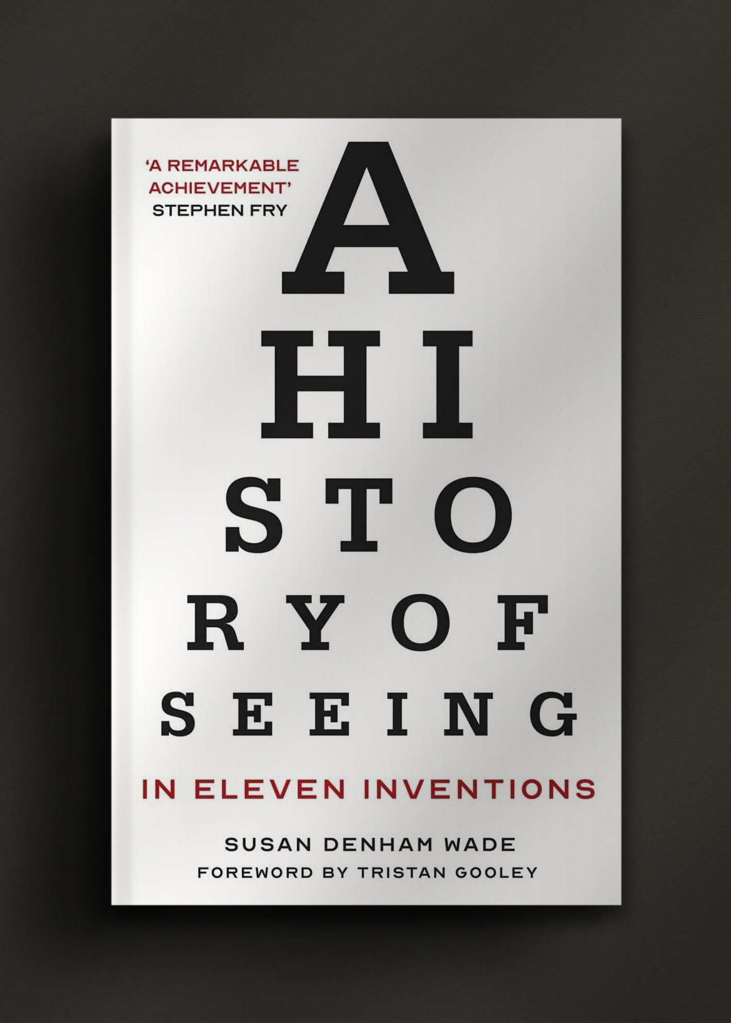 Book cover titled "A History of Seeing in Eleven Inventions" by Susan Denham Wade, with a foreword by Tristan Gooley. Text design resembles an eye chart.