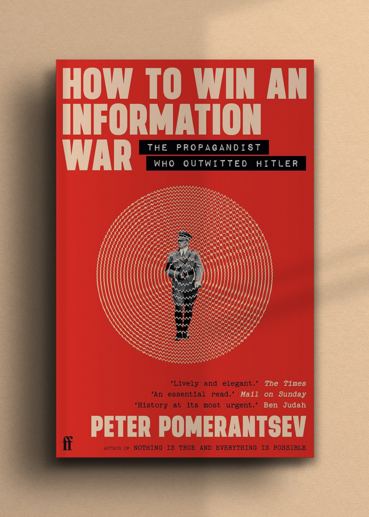 Book cover titled "How to Win an Information War" in bold white text on red. Full body portrait of Adolf Hitler in concentric circles. Author: Peter Pomerantsev.